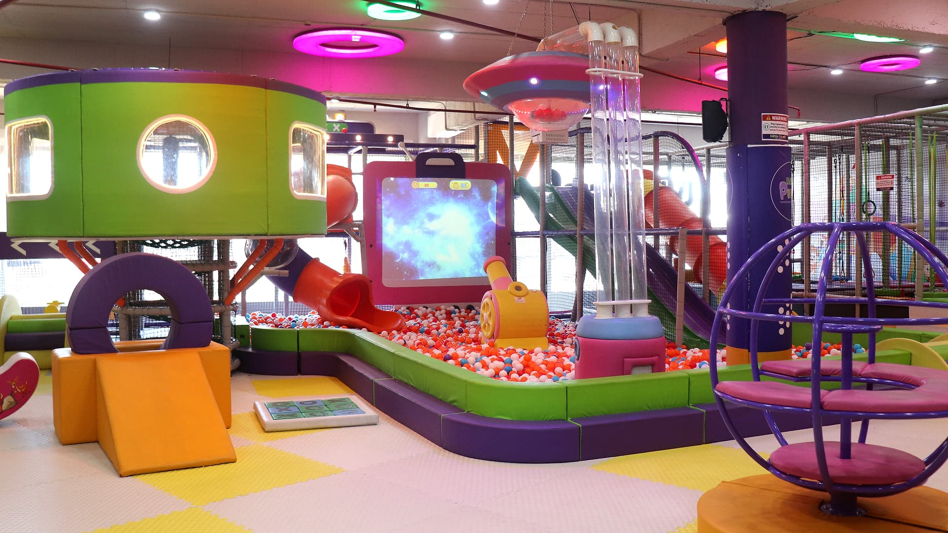 The main indoor play arena at Little Peppe, Aluva, Kochi with ball pool, slides and soft play zones